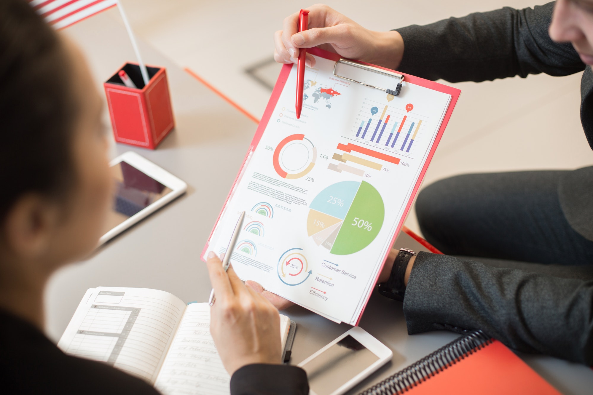people-discussing-marketing-report.jpg